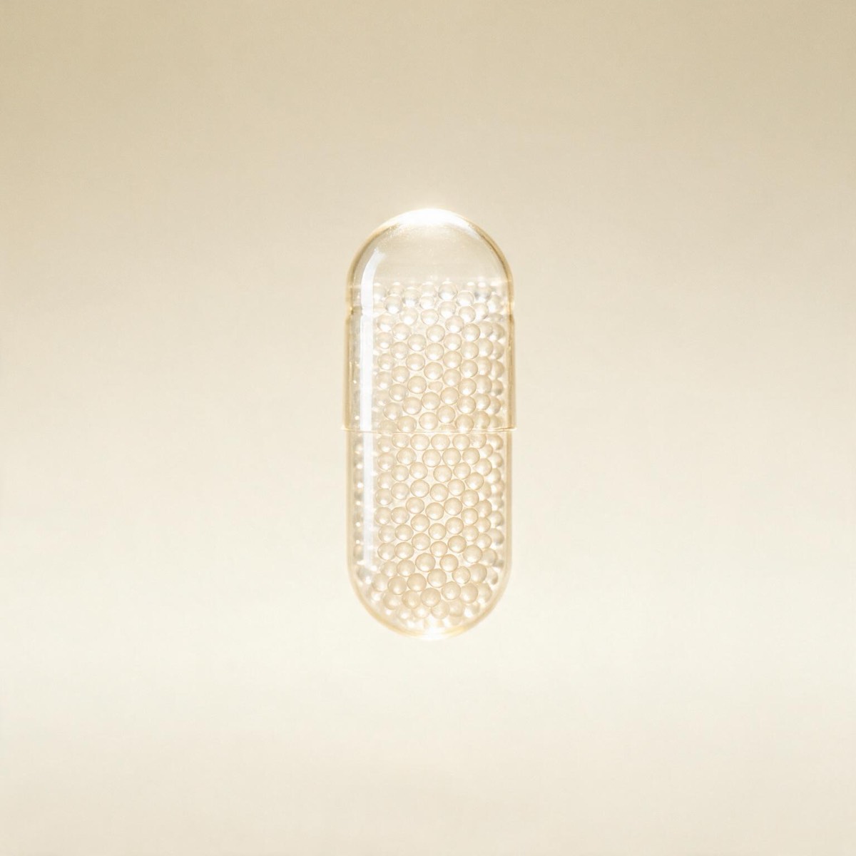 A translucent capsule suspended in still air